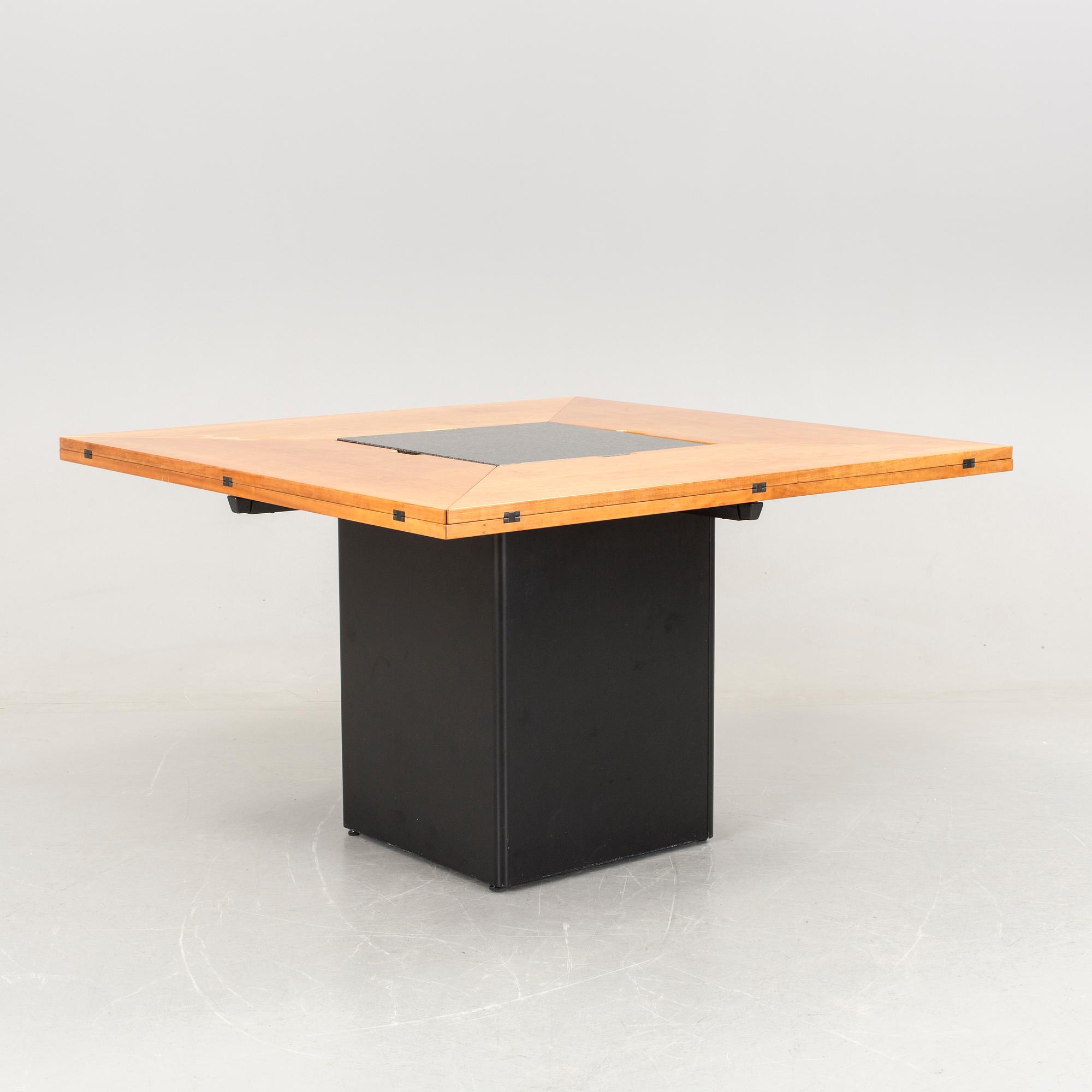 A Bob van den Berghe "Cirkante" table and 6 "Iris" chairs, Van den Berghe-Pauvers, Gent, 21h Century.