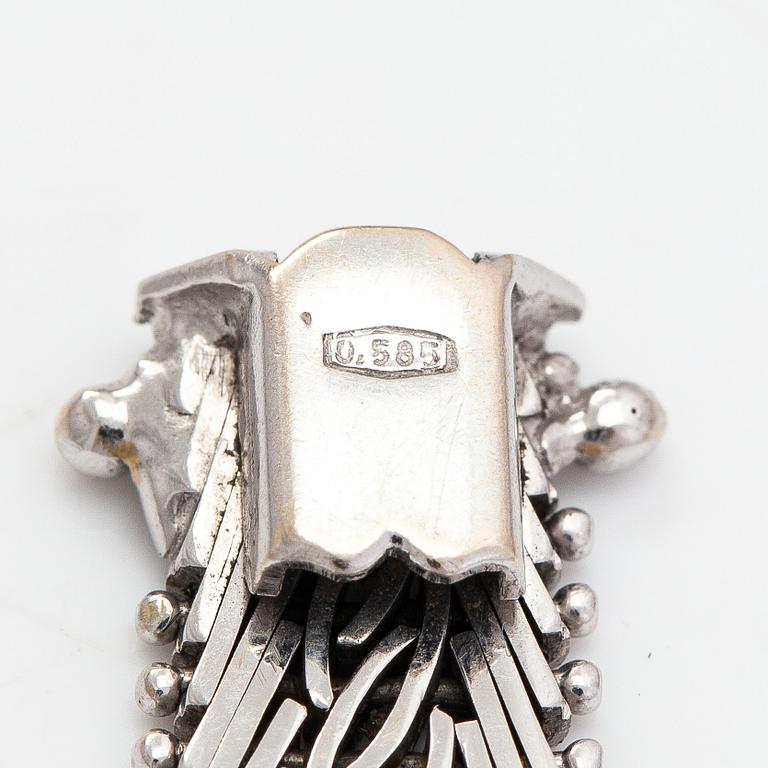 A 14K whitegold bracelet, Finnish importmarks Turun Kultaseppä Oy 1974.