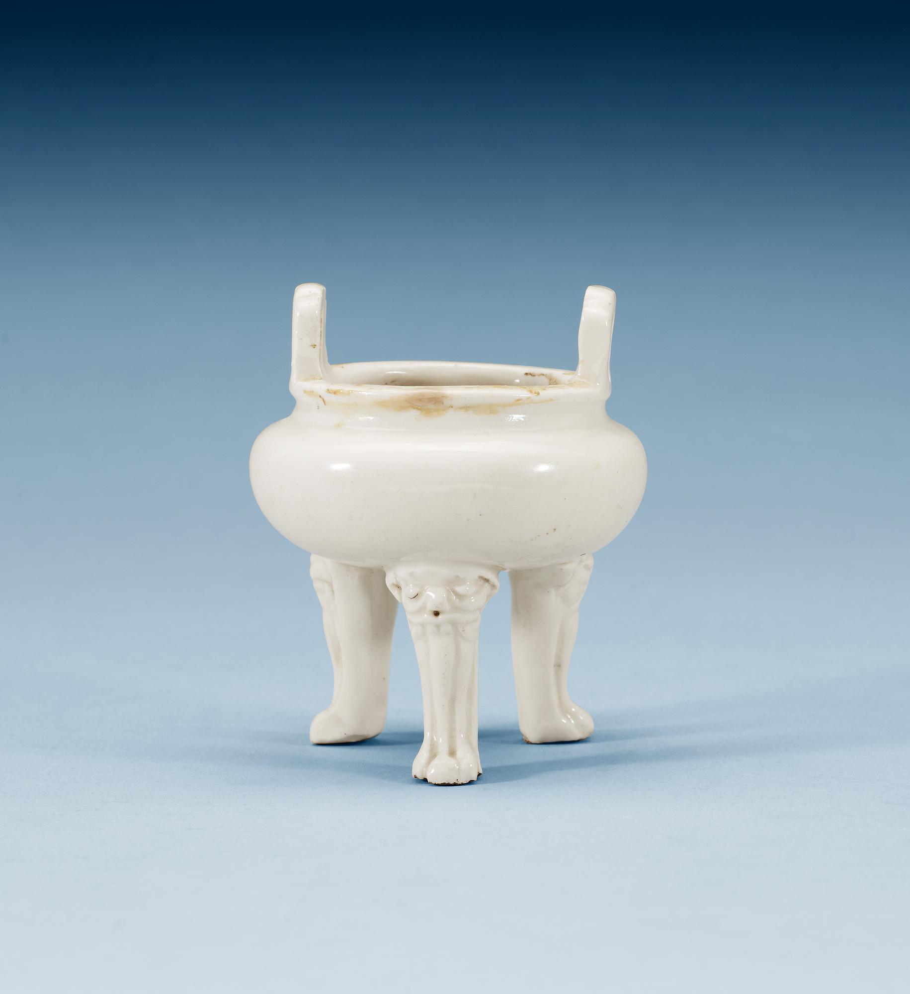 A blanc de chine miniature tripod censer, Qing dynasty, Kangxi (1662-1722).
