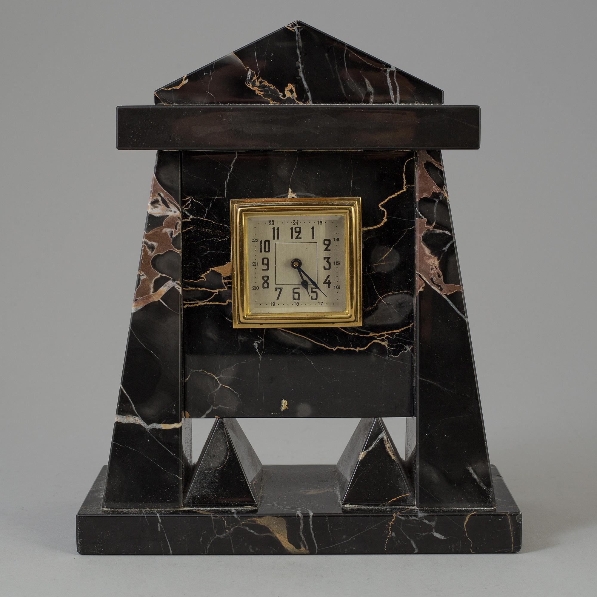 A 20th century marble mantle clock and lidded box.