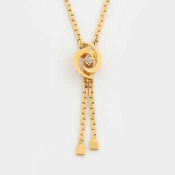 Collier, 18K gold with a small diamond.