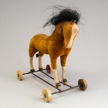 LEKSAKSHÄST, på hjul, 1900-talets början.