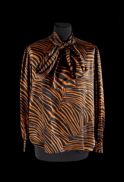 A set of two blouses by Yves Saint Laurent.