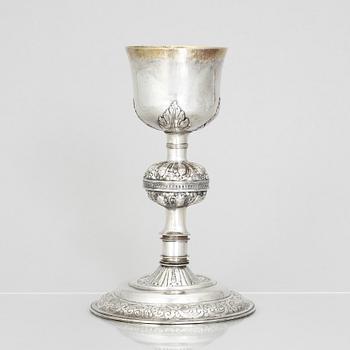 An 18th century parcel-gilt silver cup and paten, unmarked.