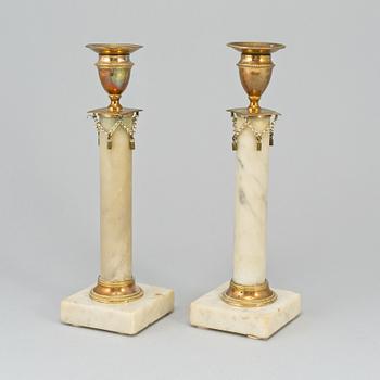 A pair of late gustavian  candlesticks, ca 1800.