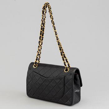 A bag by Chanel,  "Double Flap 23".