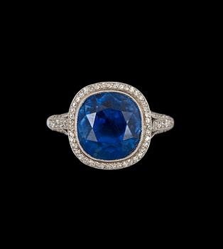877. A sapphire, circa 11.25 cts, and old-cut diamond, total carat weight circa 1.00 ct, ring.