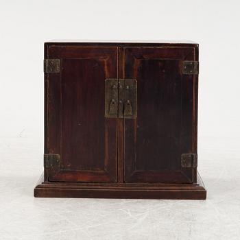 A Chinese hardwood cabinet, later part of the 20th Century.