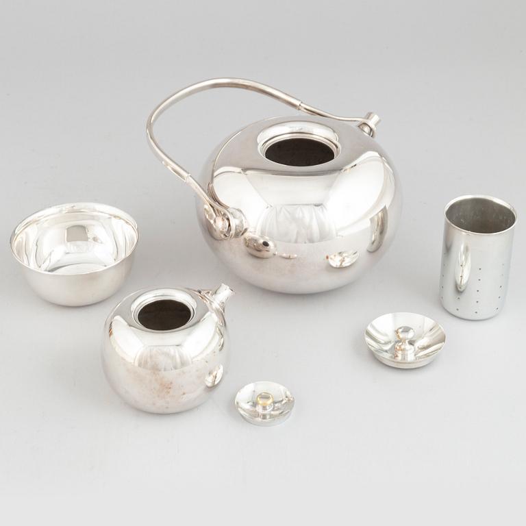 Vivianna Torun Bülow-Hübe, an electroplated brass teapot, a creamer and a sugarbowl, Dansk International Designs Ltd.