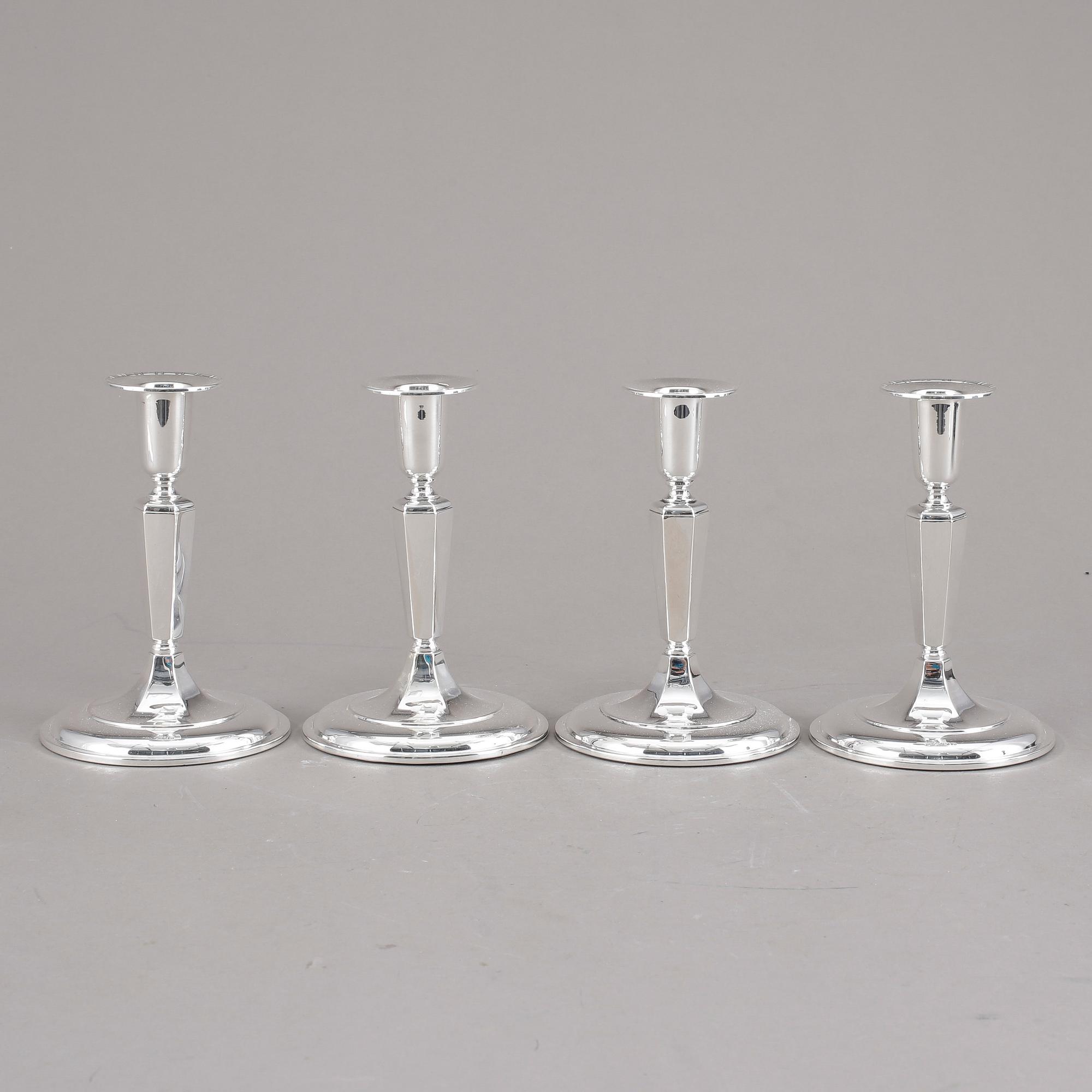 LJUSSTAKAR, 4st snarlika, silver, K&EC, Göteborg, 1956.