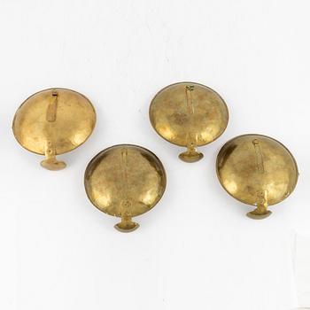 Karl-Erik Torssell, a set of four brass 'Kungalampetten' one-light reflector plates.