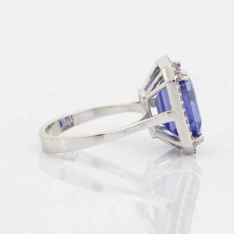 Emerald cut tanzanite and brilliant cut diamond cocktail ring.