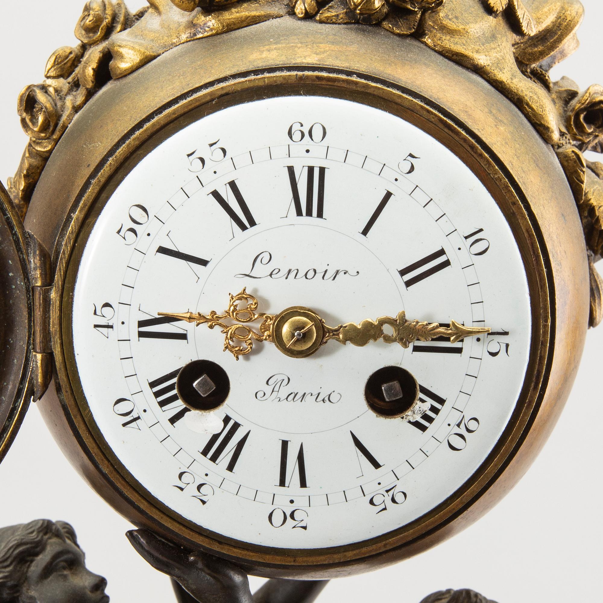 A Louis XVI-style table clock around 1900.