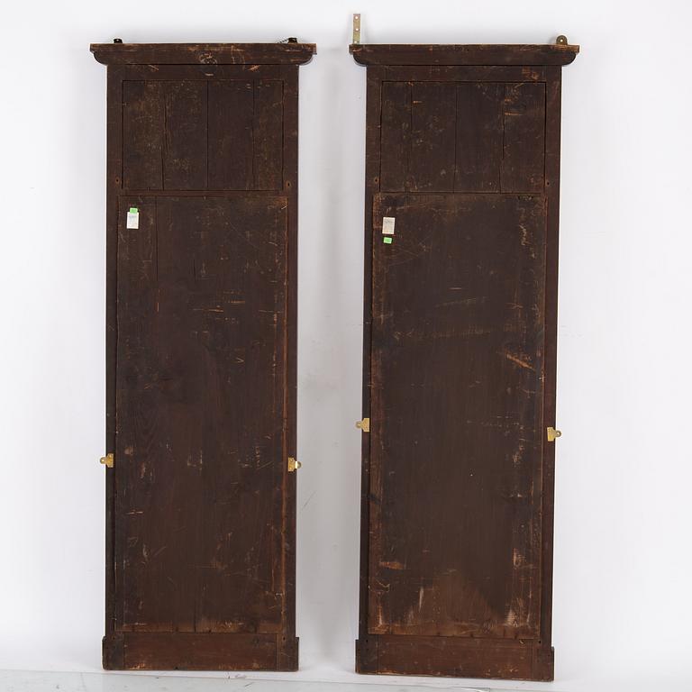 A pair of Biedermeier mahogany mirrors and one console table, 19th century.