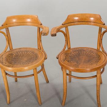 A set of four Cosmos arm chairs first half of the 20th century.