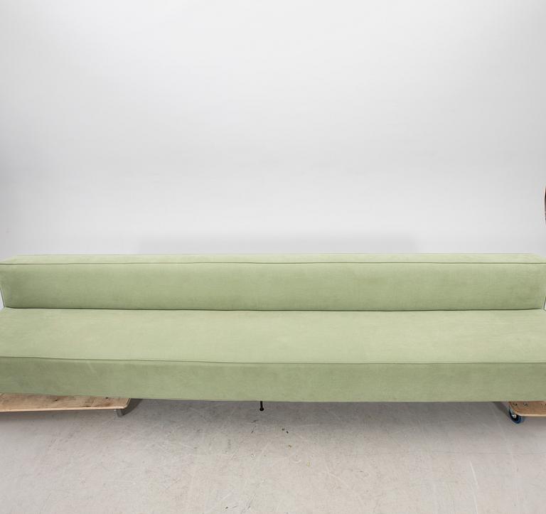 A sofa Modern Line' by Greta Magnusson Grossman, produced by Gubi, contemporary.