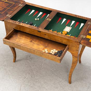 A Rococo card table, second half of the 18th Century.