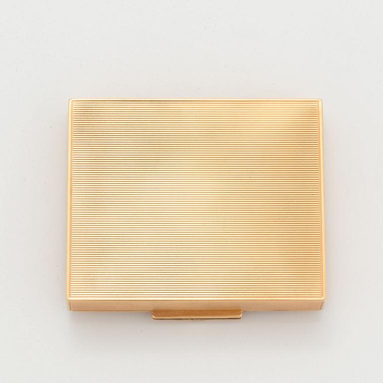 14K gold and ruby vanity case.