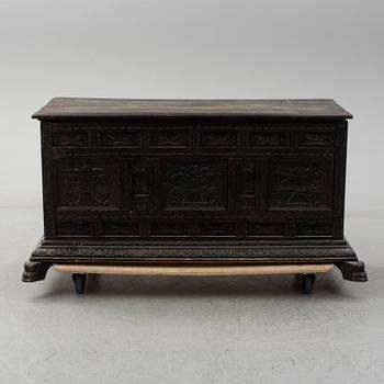 A 19th century baroque style oak chest.