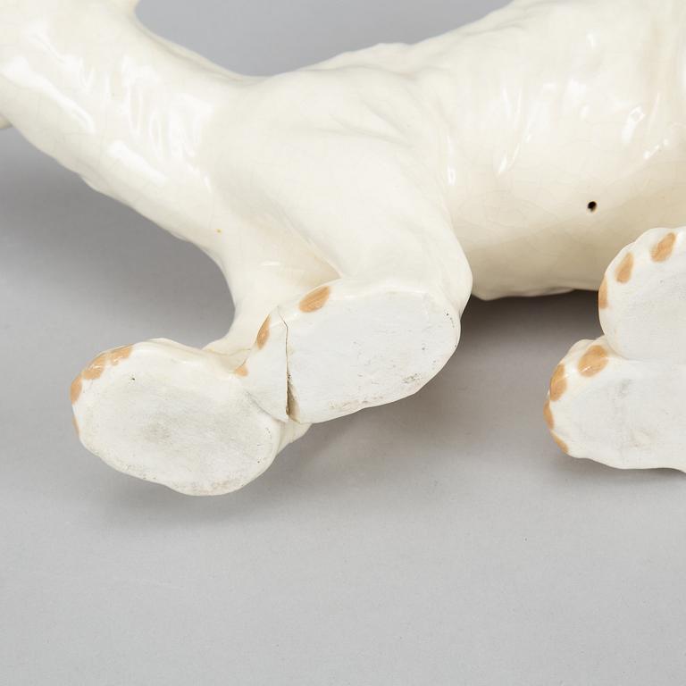 Five ceramic polar bears.