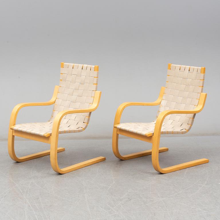 ALVAR AALTO, Pair of model '406' armchairs for Artek, late 20th century.