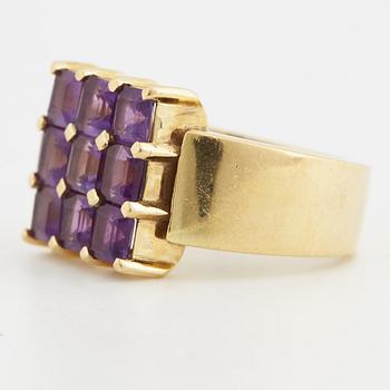 Breuning, a pair of earrings, a pendant and a ring.