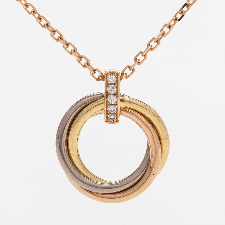 Cartier, an 18K gold 'Trinity Pendant' necklace with brilliant-cut diamonds.