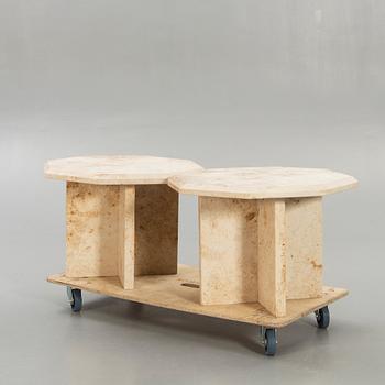 A pair of travertine side tables later part of the 20th century.