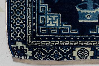 A rug, semi-antique Baotou, ca 121-122 x 59-61 cm.