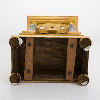 A french late Empire mantelpiece clock, first half of the 19th century.