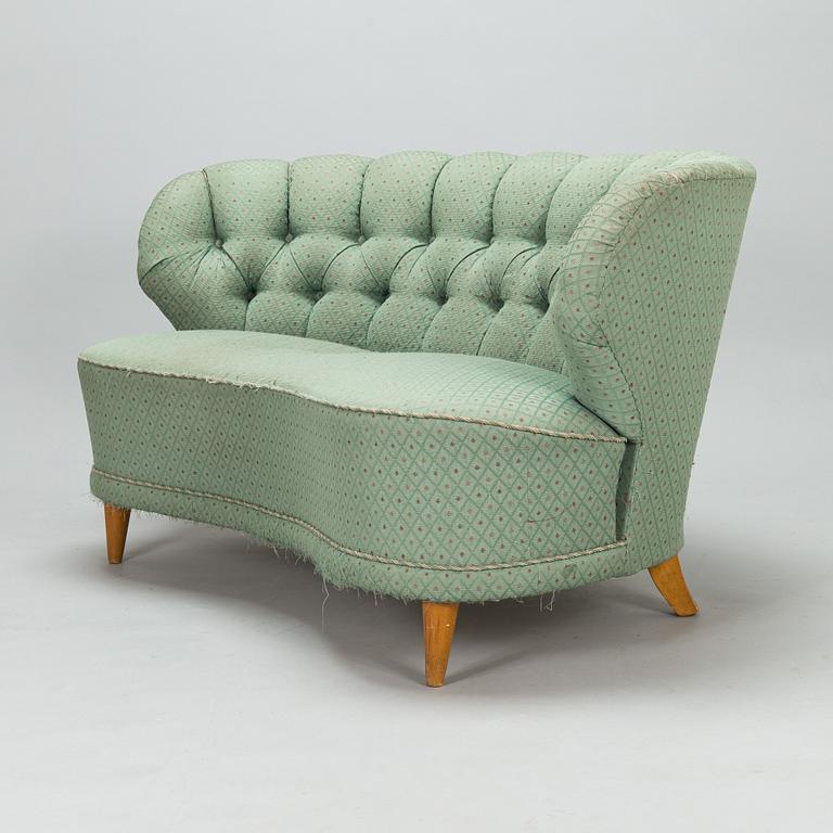 A mid-20th-century sofa.