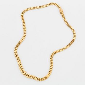 An 18K gold necklace by Jan Hellströmer.