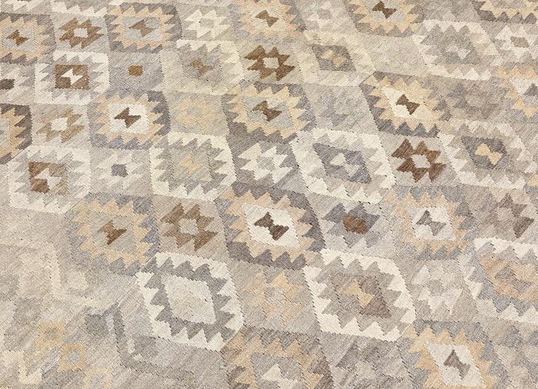 A Kilim carpet, approx. 352 x 252 cm.