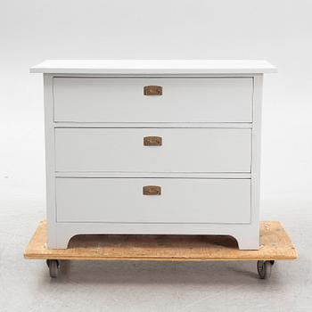 A chest of drawers, circa 1900.