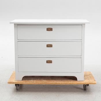 A chest of drawers, circa 1900.