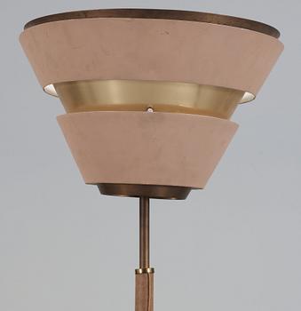 A beige lacquered floor lamp, with brass and artificial leather, possibly a scetch by Alvar Aalto, 1950's.