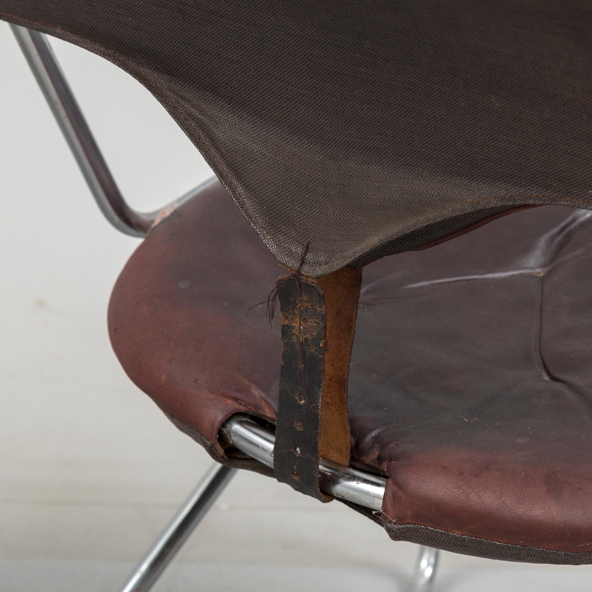 A set of four chairs by Sam Larsson, Dux, late 20th century.