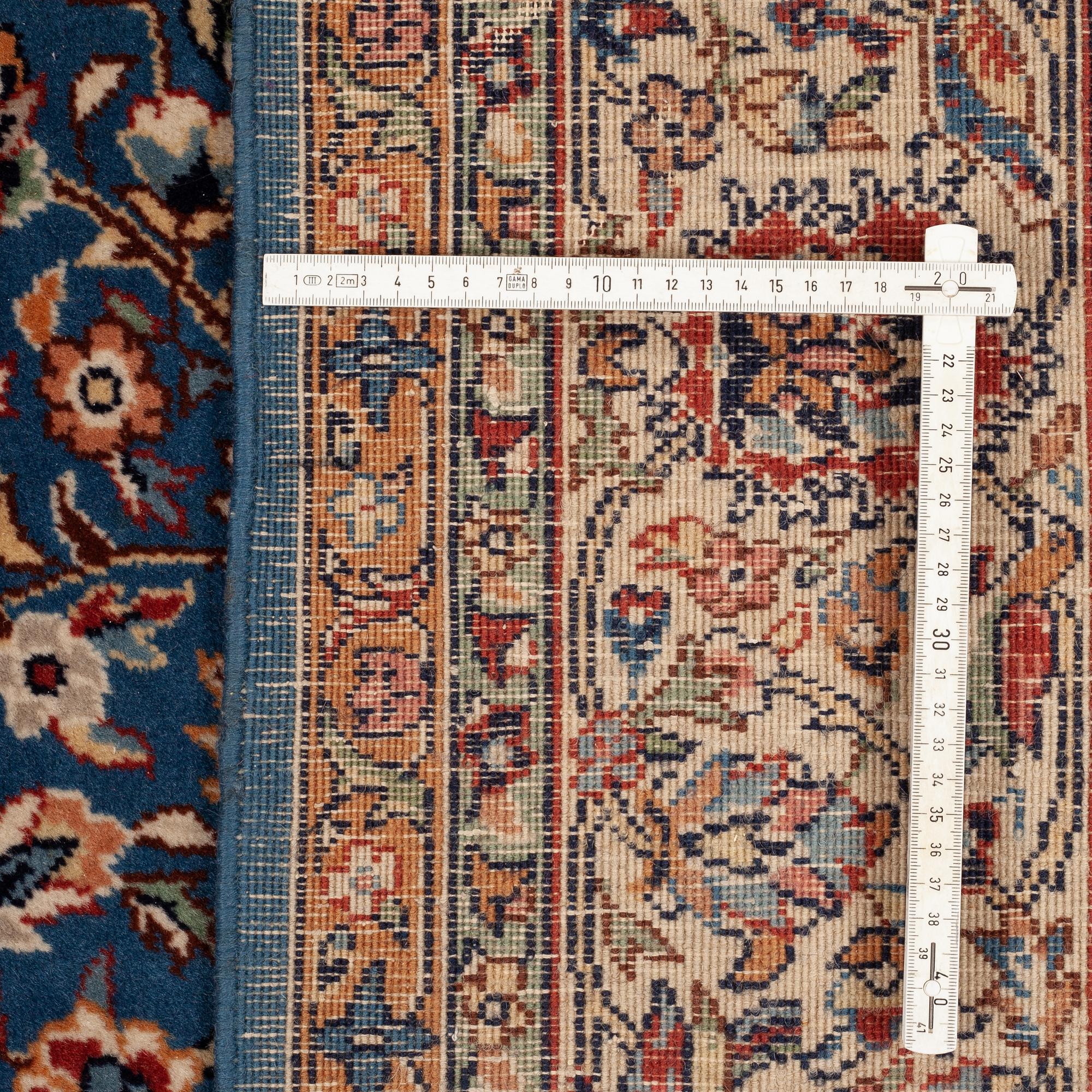 A carpet semi-antique/old oriental, ca 346 x 246 cm.