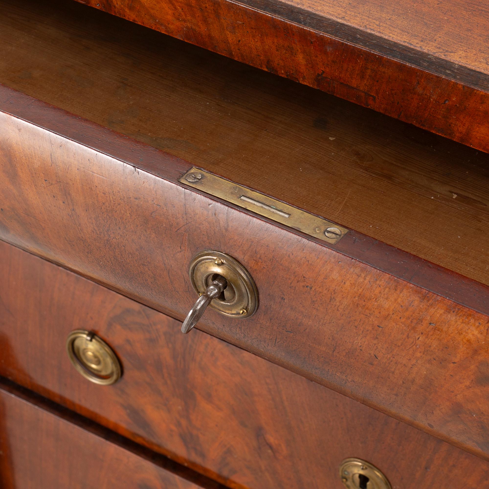 An Empire chest of drawers, first half of the/mid 19th century.