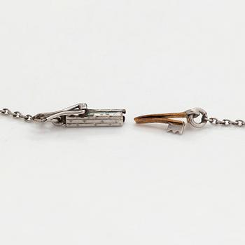 A platinum/17K gold necklace, set with old-cut diamonds, first half of the 20th century.