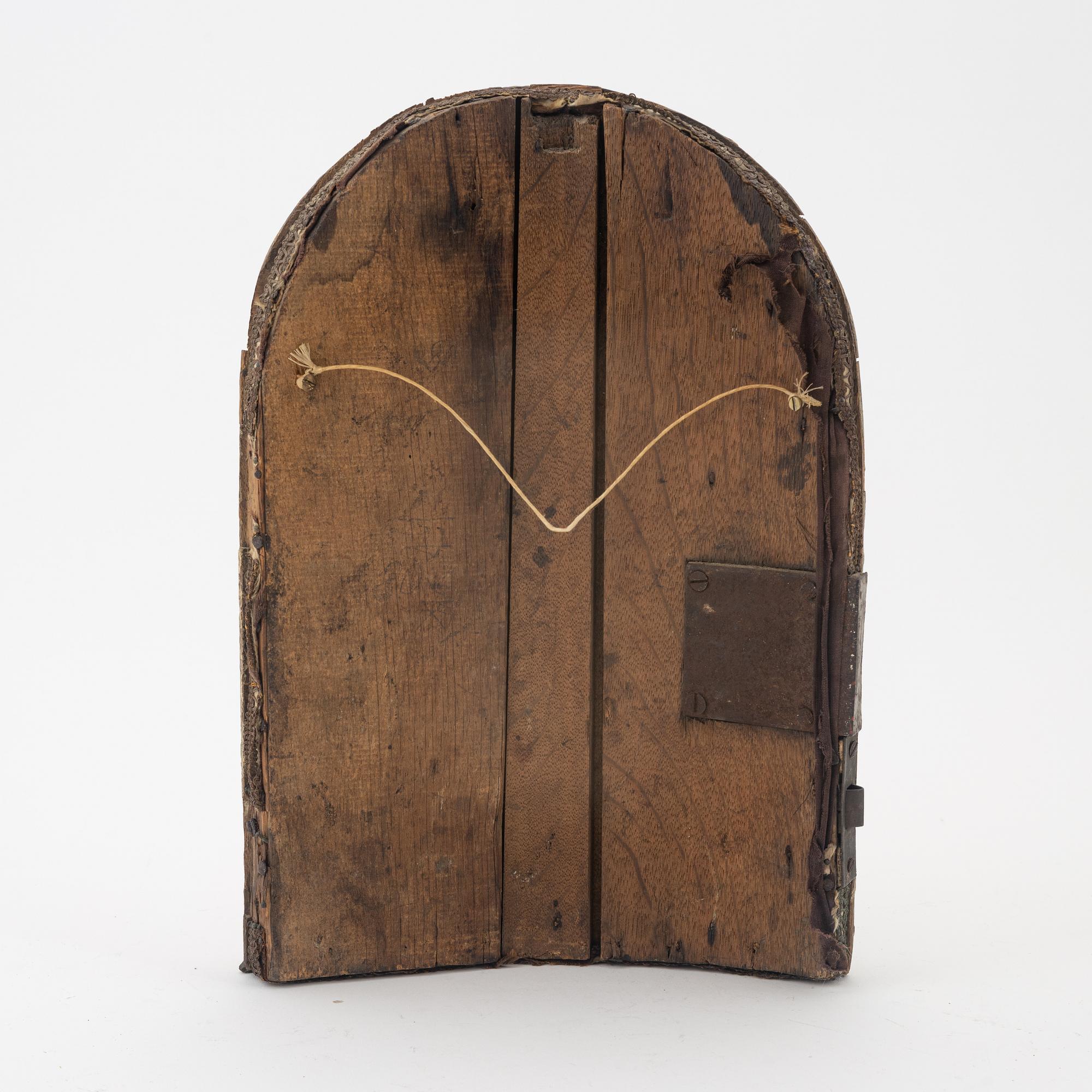 A carved and giltwood door to a church tabernacle, 18th/19th Century.