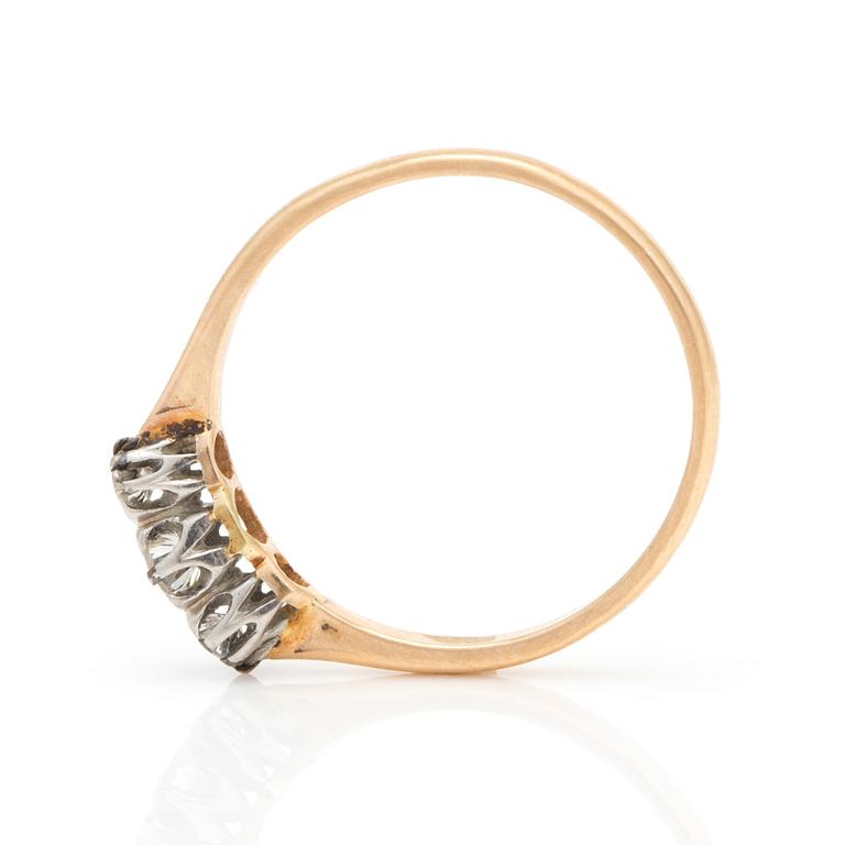 A ring with old-cut diamonds.