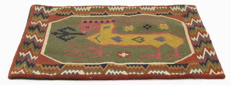 A cushion, flat weave, 58 x 51 cm, probably Skytts or Oxie district. Scania, circa 1900.