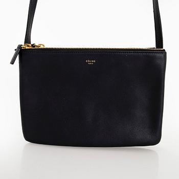Céline, a black leather 'Trio Small' bag.