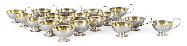 A set of eighteen Swedish 20th century silver punch cups.