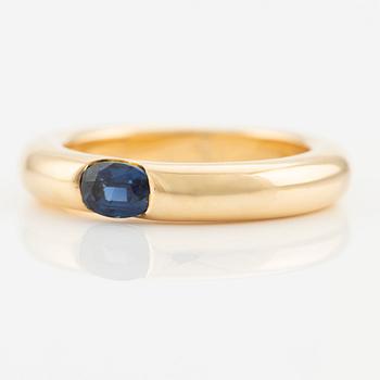 Cartier, ring, "Ellipse", 18K gold with faceted sapphire.