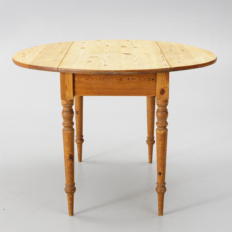 A folding table, early 20th Century.