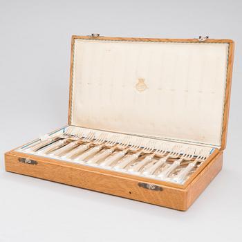 A 24-piece set of fish cutlery in silver, mark of CGH, Stockholm 1899. Original box.