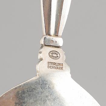 A silver sandwish spade and a silver and stainless steal cheese knife, "Konge/Acorn" from Georg Jensen.