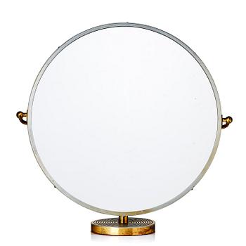 191. Josef Frank, a white metal and brass table mirror, model "H 2214", Firma Svenskt Tenn, mid-20th century.